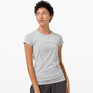 Swiftly Tech Short Sleeve Shirt 2.0 black and white shirt size 4